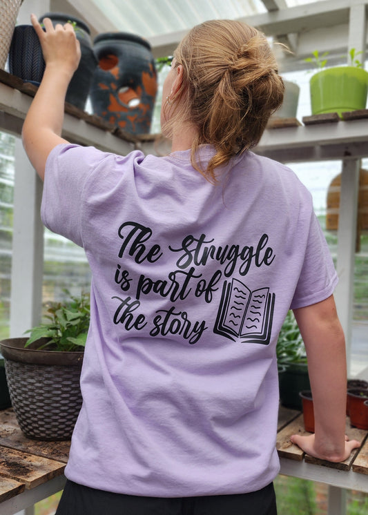 Purple biblical women clothes t shirt saying, The Struggle is Part of the Story with an open Bible