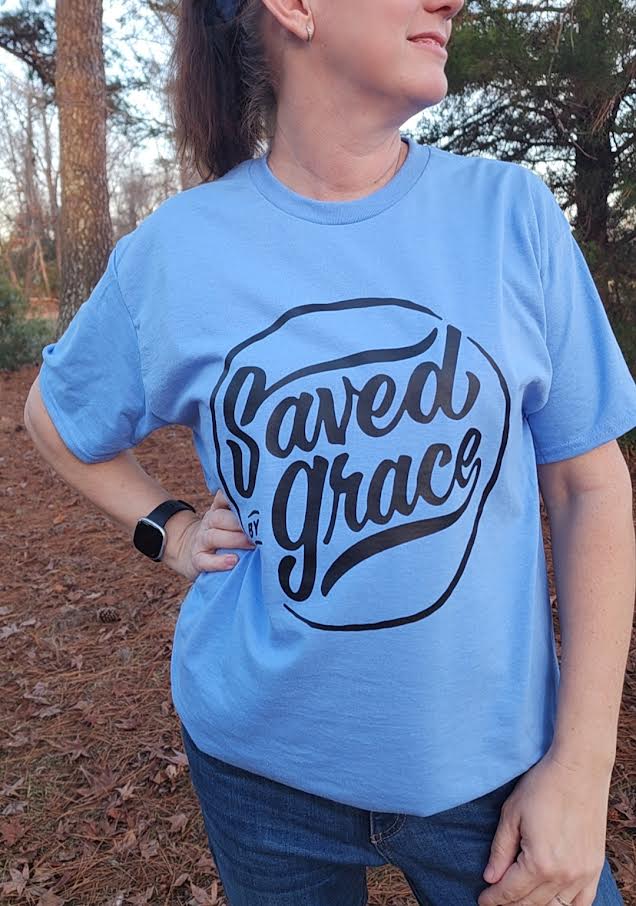 Light blue God shirt with the wording, Saved by Grace