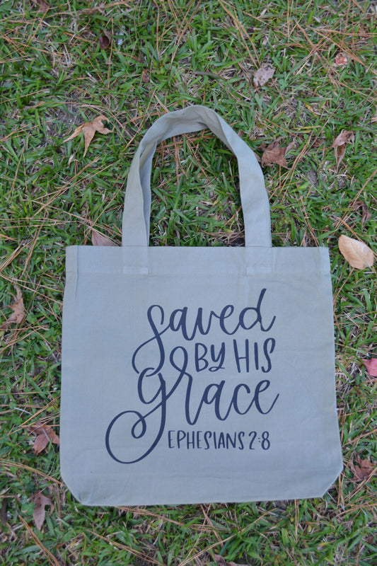 Christian tote bag with the wording saved by His grace
